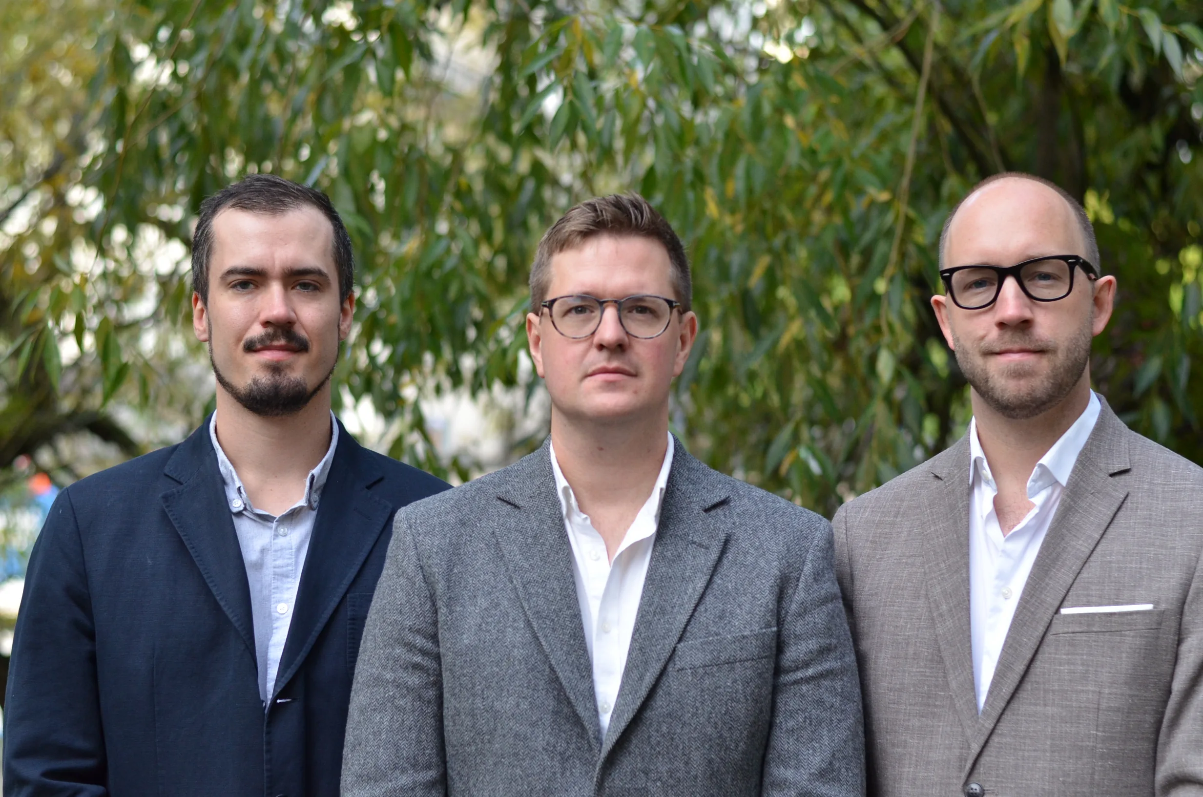 Jon Lachmann, Fredrik Giertz and Victor Magnusson, the Analyzera team, photographed outdoors in Stockholm.
